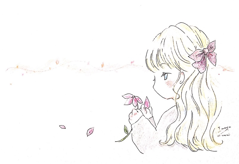 花占いをする女の子